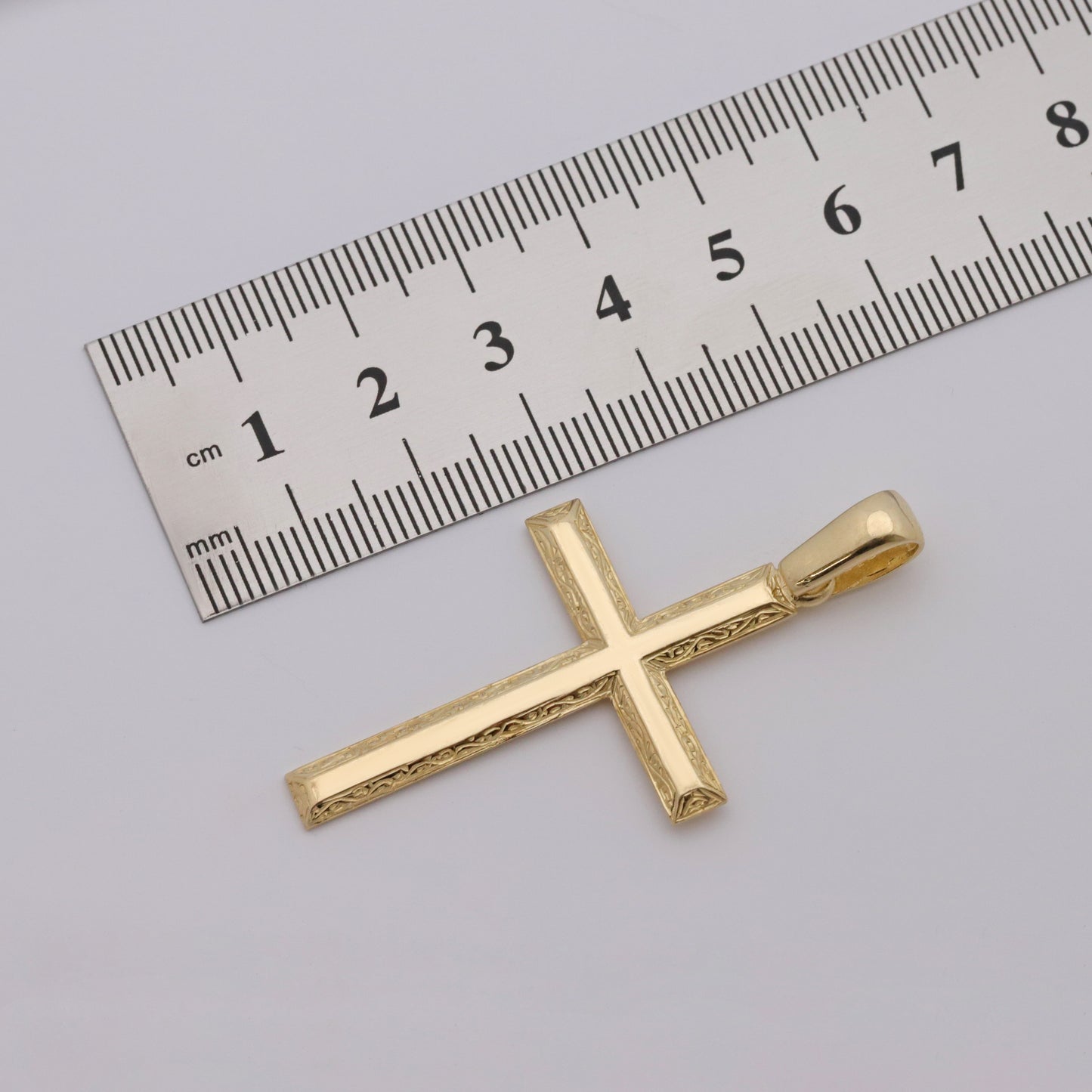 9ct Yellow Gold Scroll Patterned Beveledge Cross Pendant