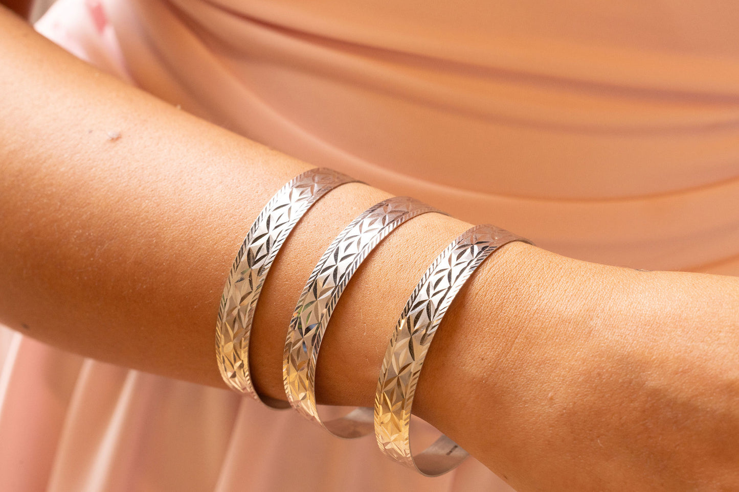 9ct Yellow Gold Diamond Cut & Carved Ladies Bangle
