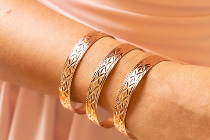 9ct Yellow Gold Diamond Cut & Carved Ladies Bangle